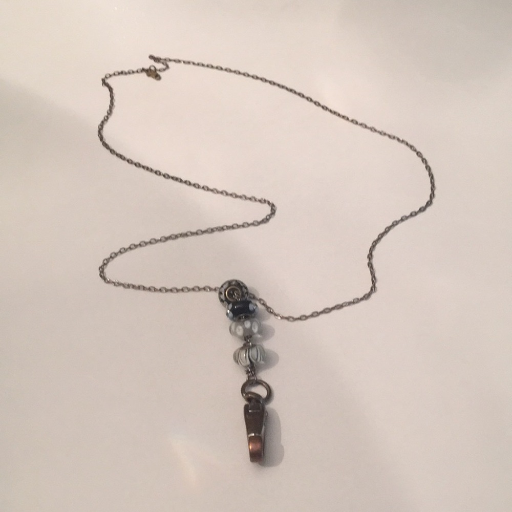 Black beaded lanyard.